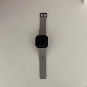 Fitbit grey smart watch - with charger